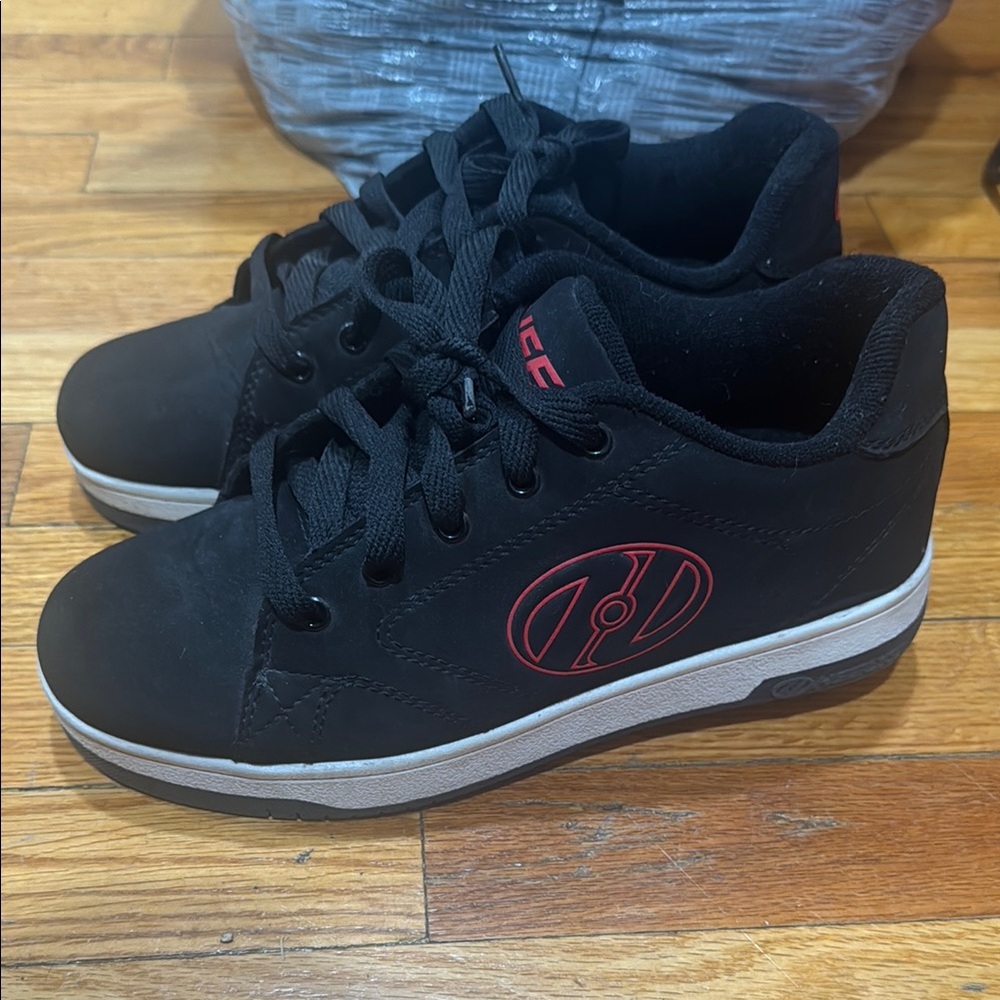 Black Sneakers with Red Logo
